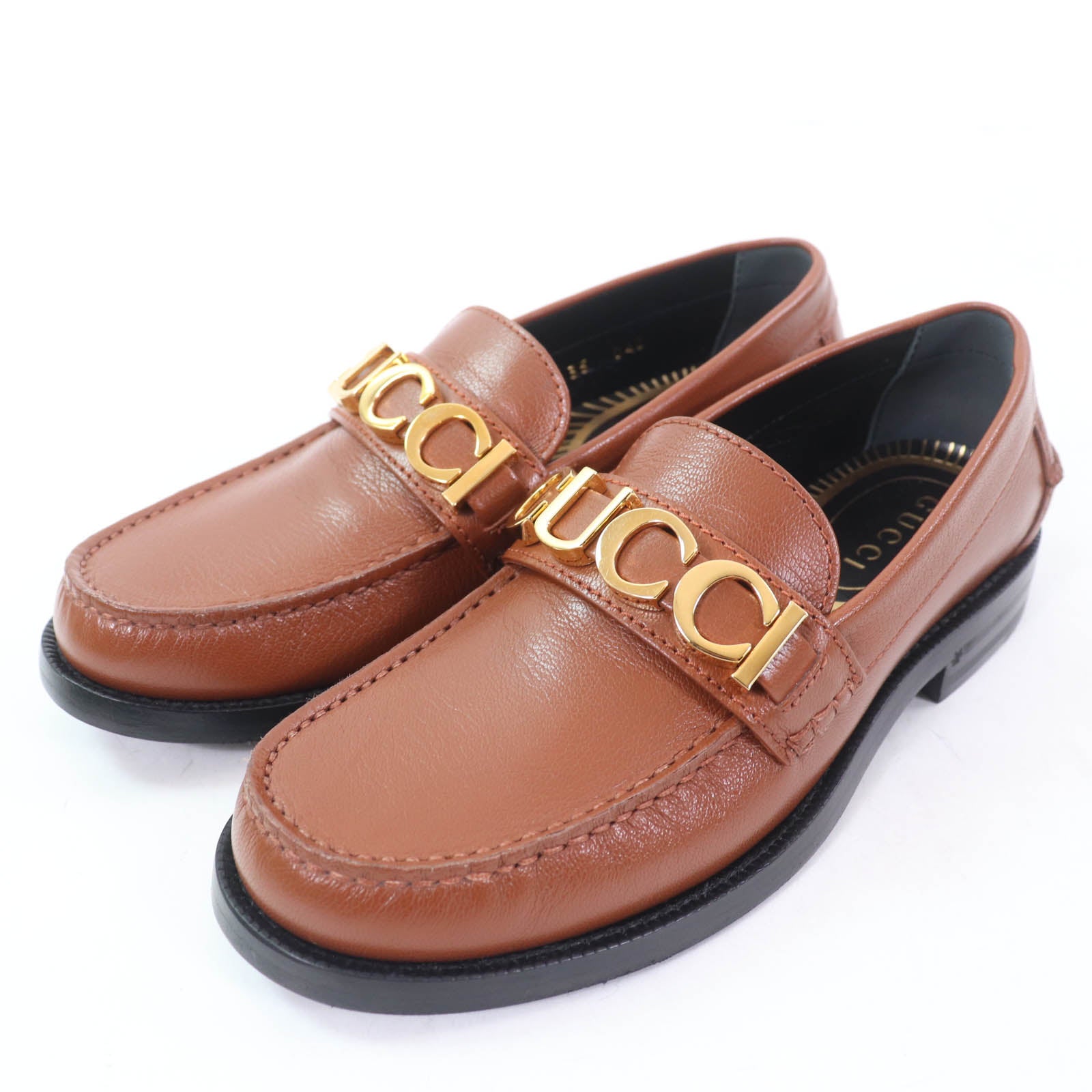 Gucci Logo Metal Leather Loafers
