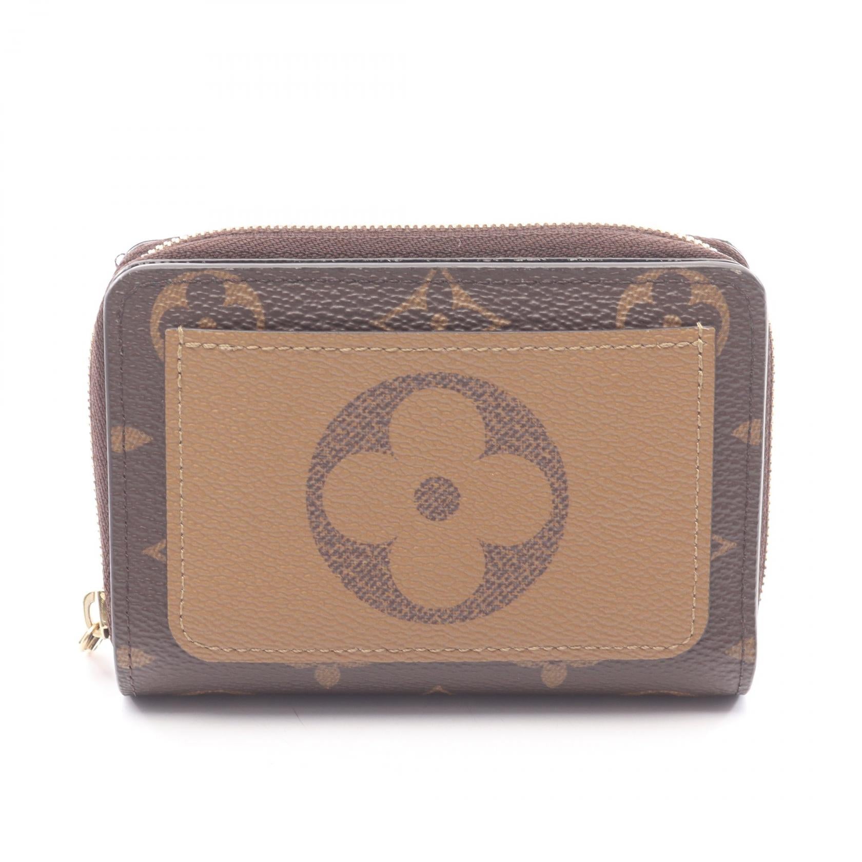Louis Vuitton Portefeuille Lou Monogram Reverse Leather PVC Wallet