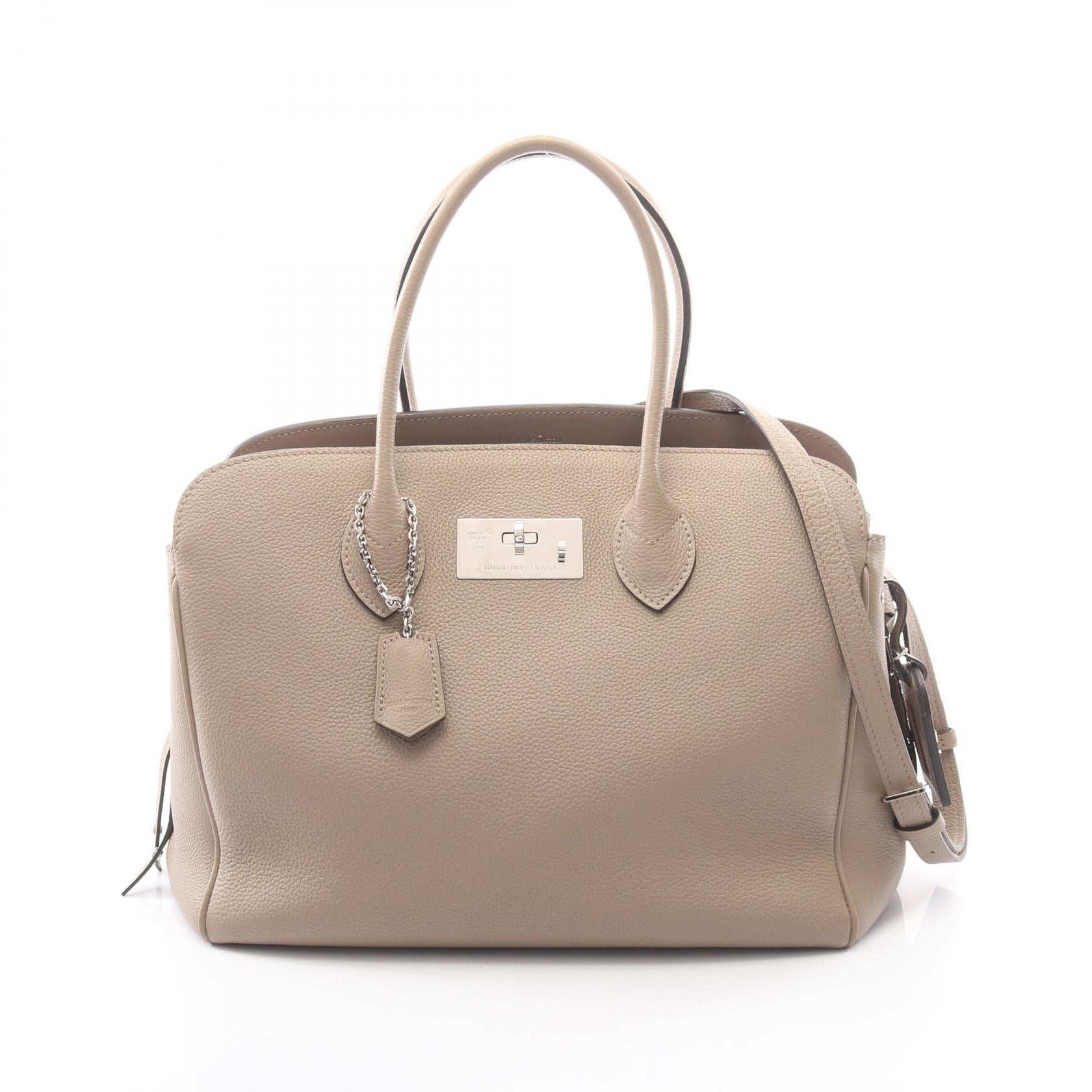 Louis Vuitton Mira MM Calfskin Handbag