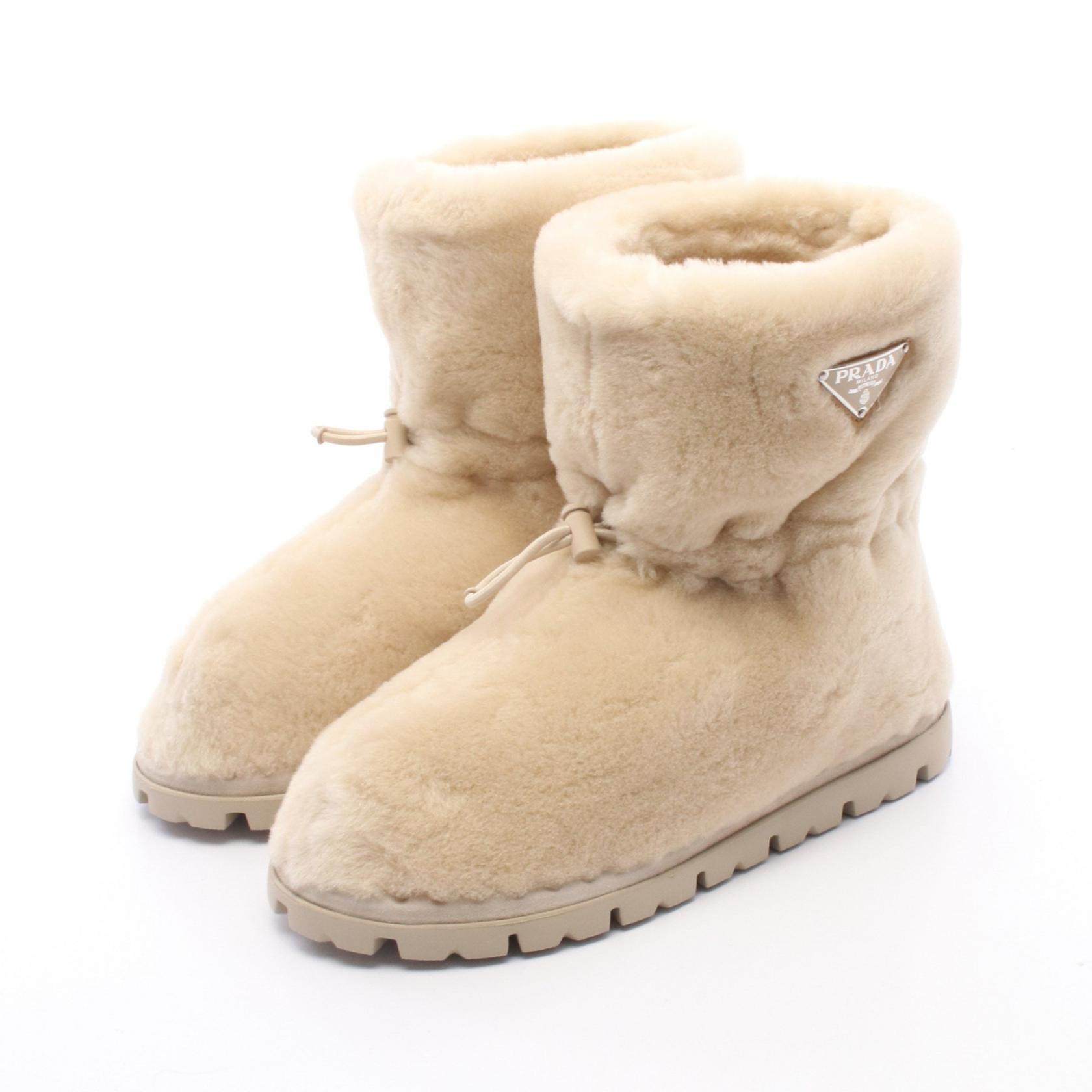 Prada Shearling Boots