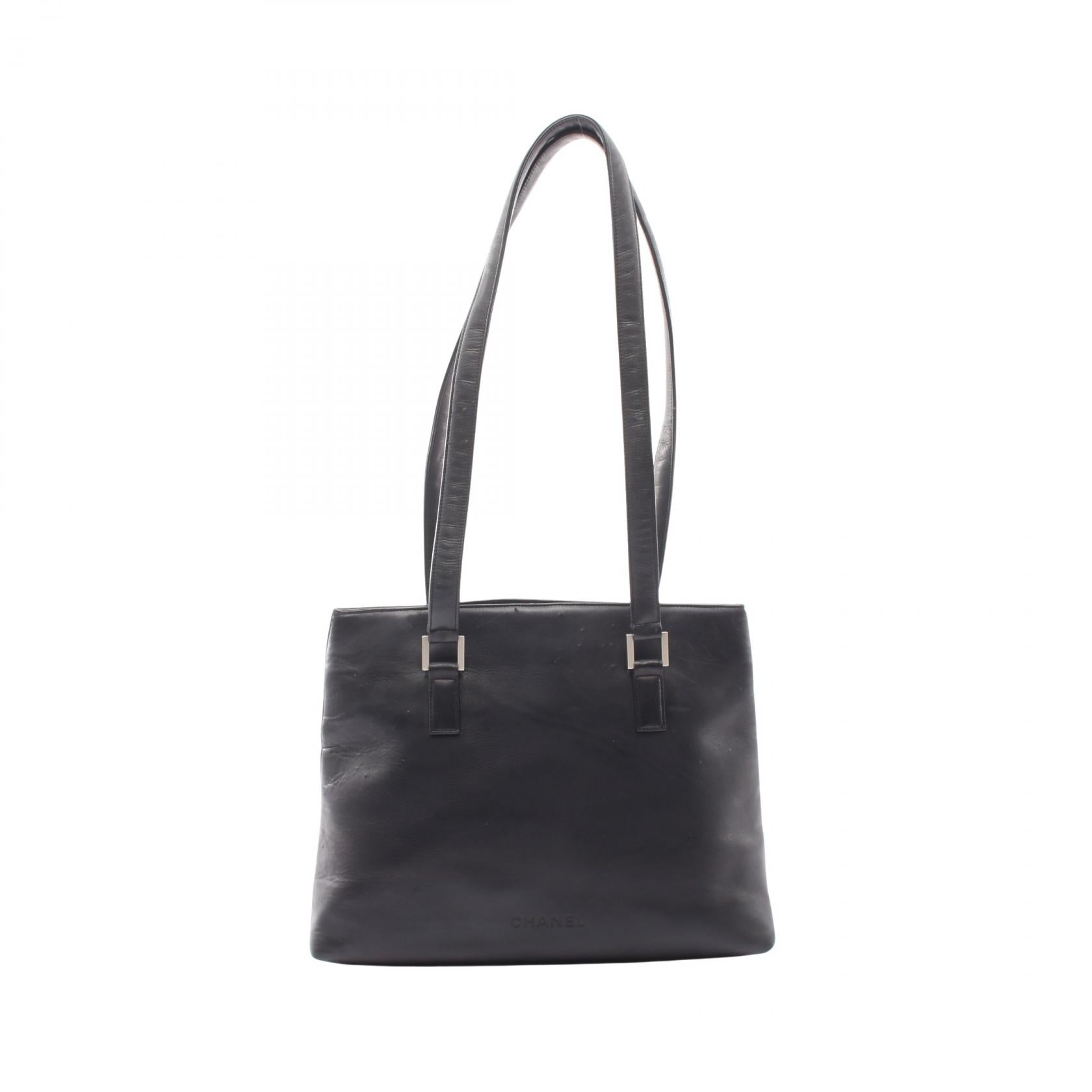CHANEL Embossed Logo Lambskin Shoulder Bag