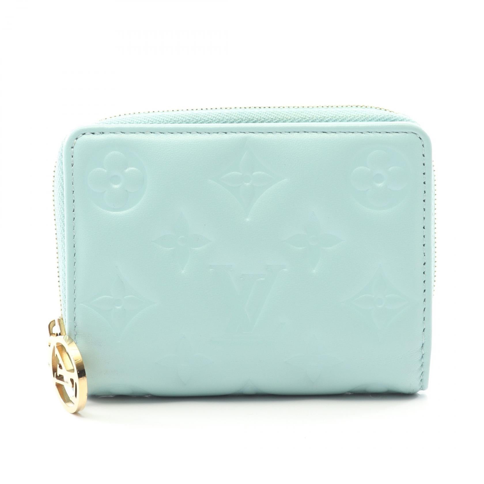 Louis Vuitton Portefeuille Lou Monogram Embossed Leather Bifold Wallet