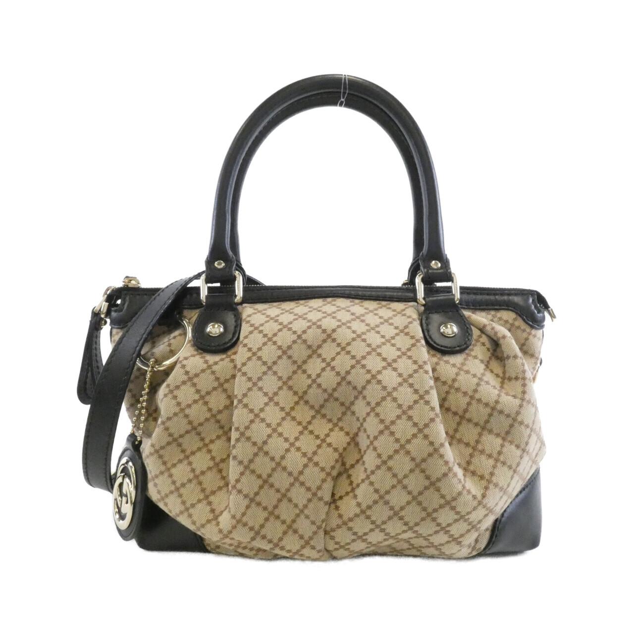 Gucci GG Supreme Leather Handbag