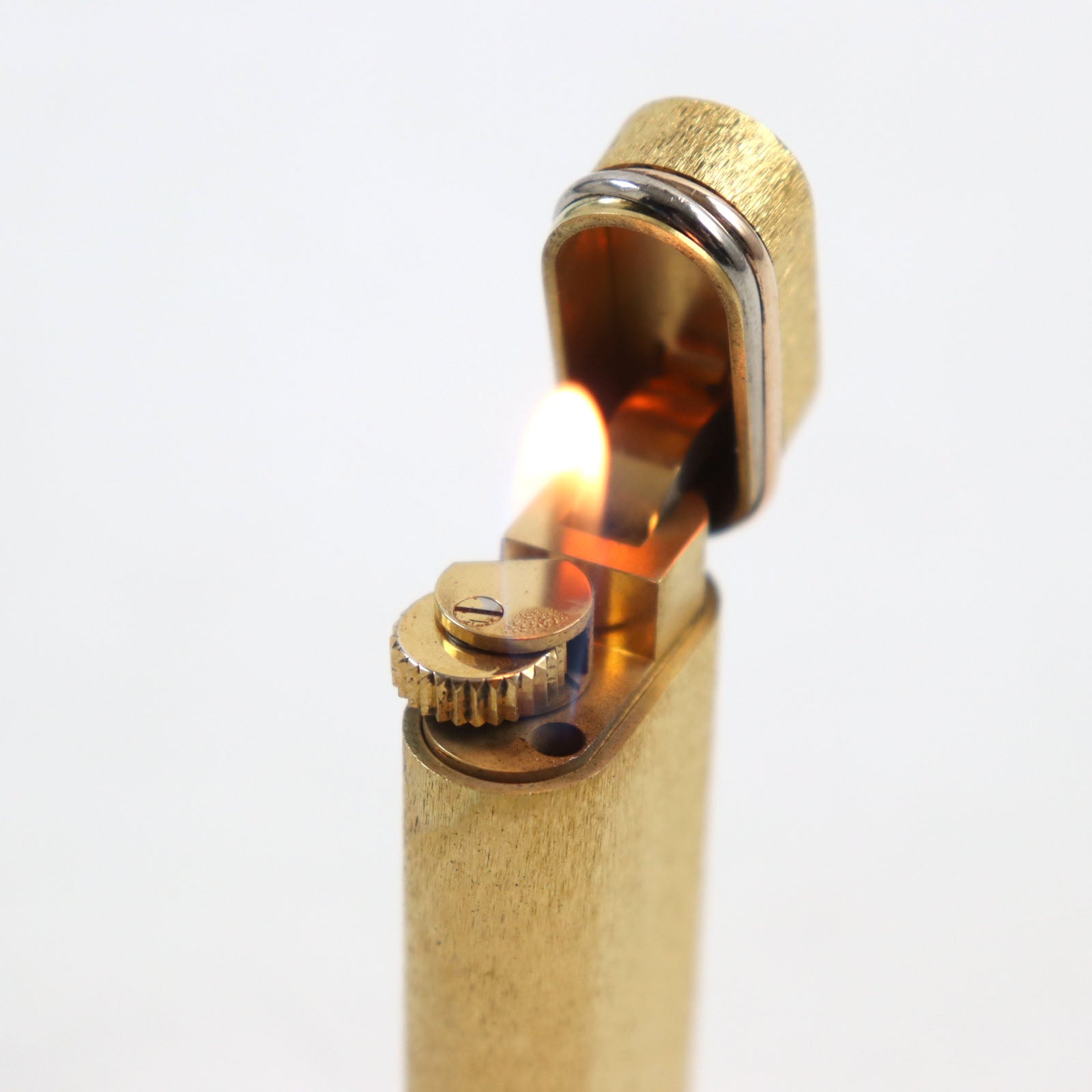 Cartier Trinity Oval Roller Lighter Gold Swiss