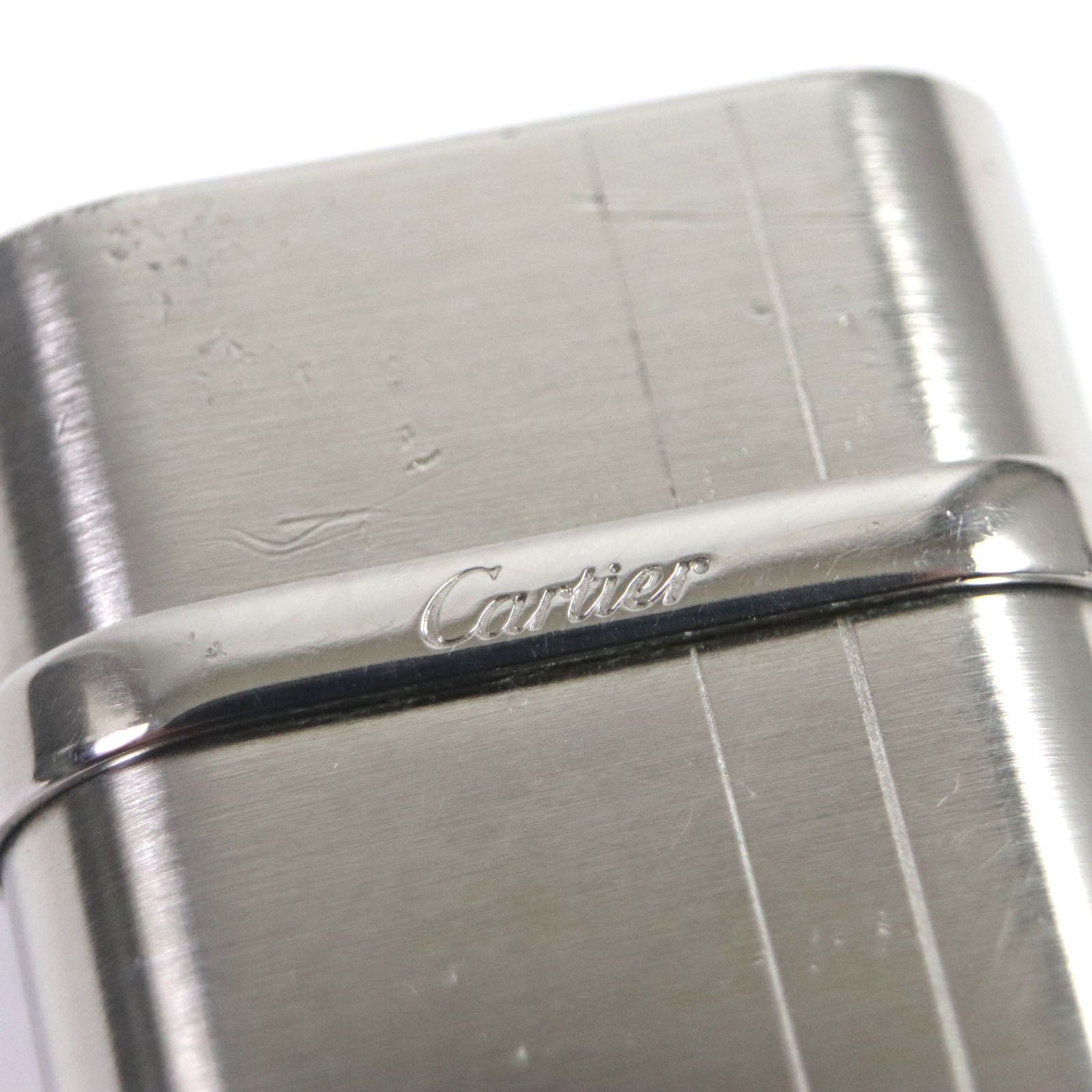 Cartier Oval Godron Logo Roller Gas Lighter Silver