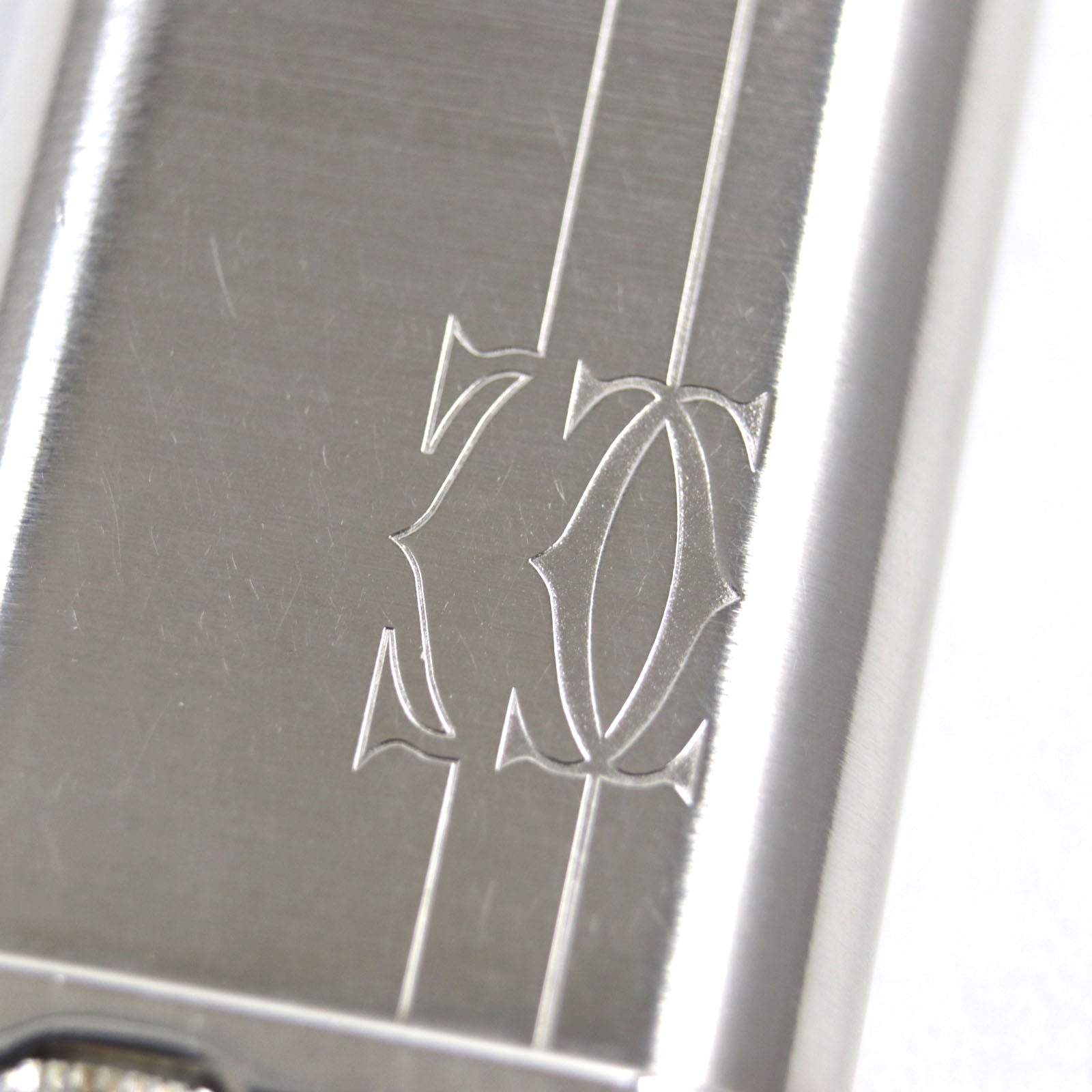 Cartier Silver Oval Lighter Logo Engraving