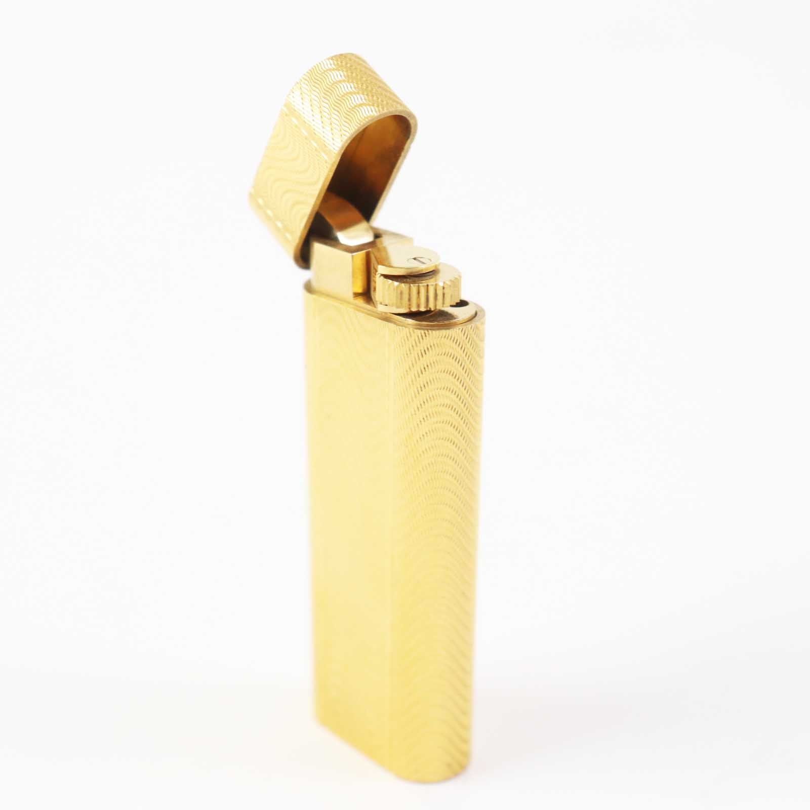 Cartier Oval Roller Wave Gas Lighter Gold