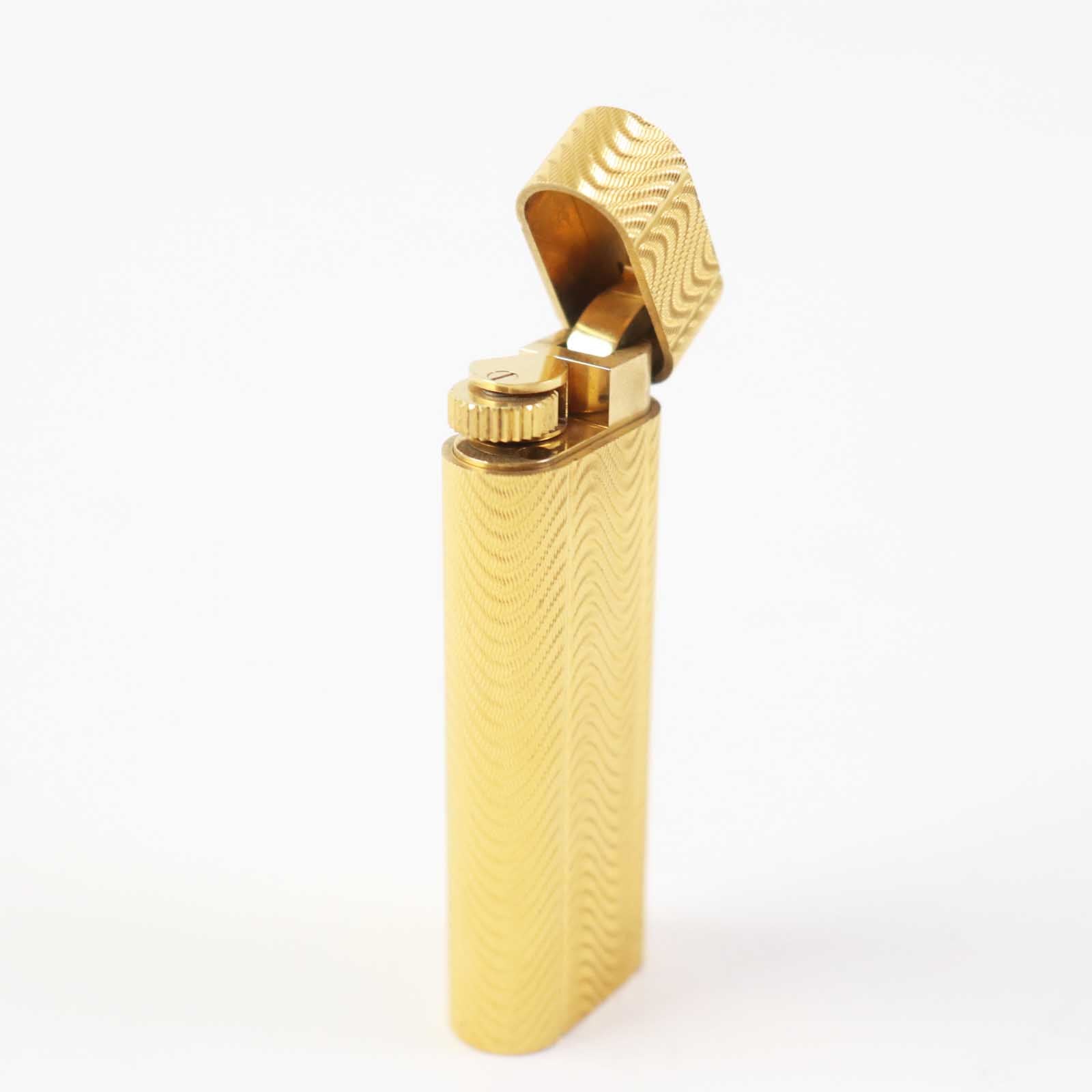 Cartier Oval Roller Wave Gas Lighter Gold