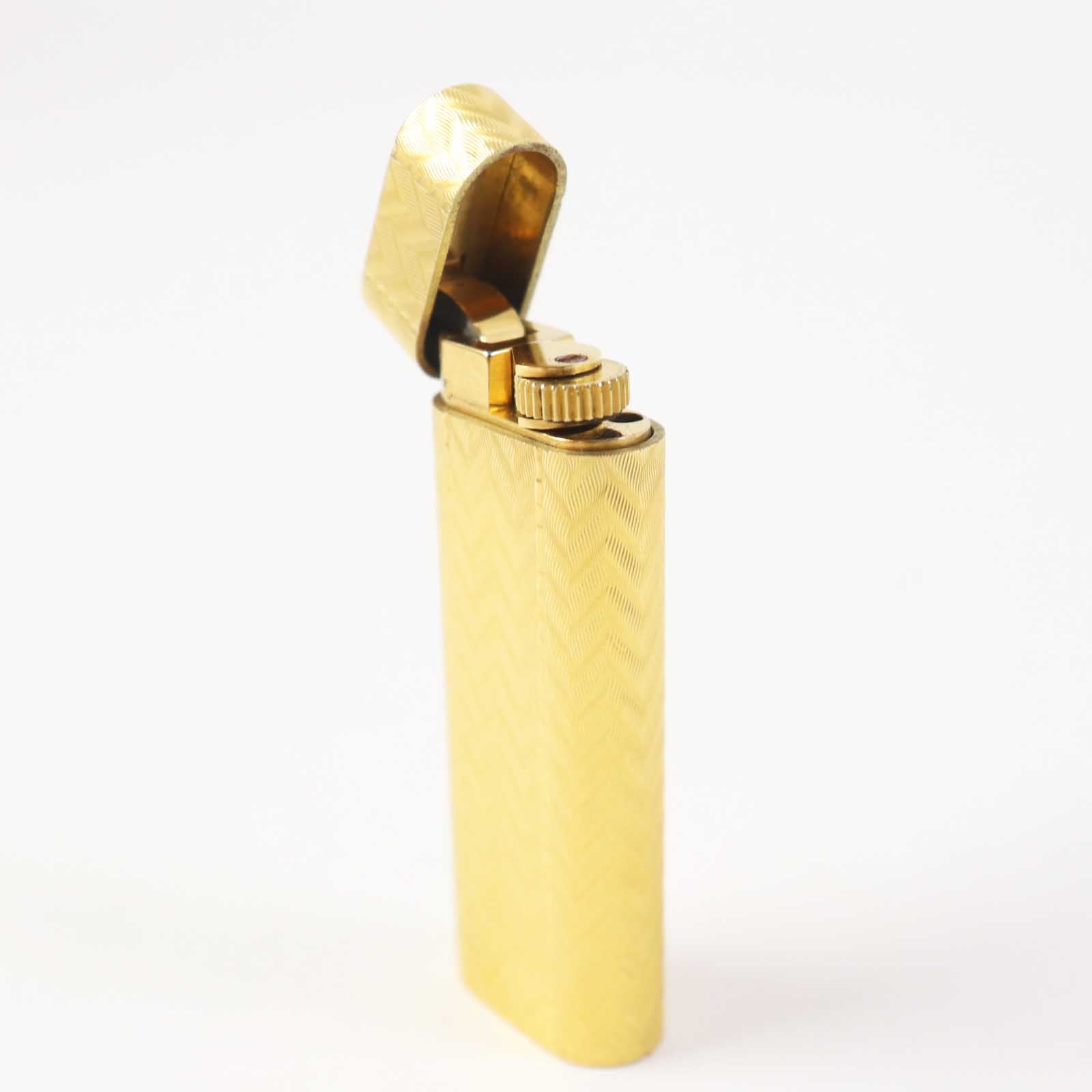 Cartier Oval Roller Chevron Gas Lighter Gold