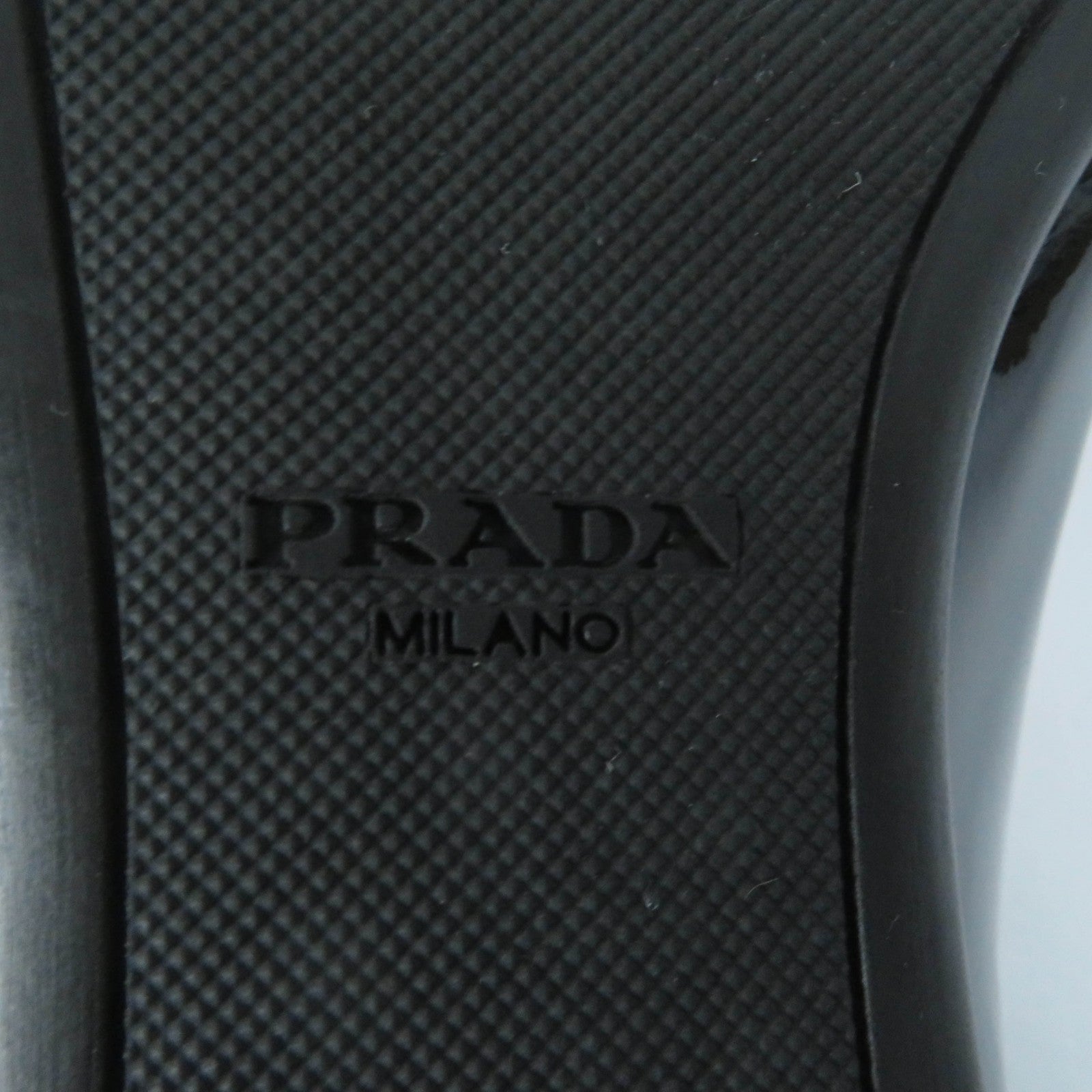 Prada Embossed Logo Leather Pumps Black 35