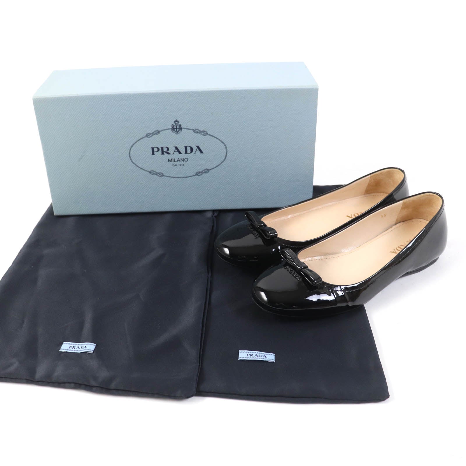 Prada Embossed Logo Leather Pumps Black 35