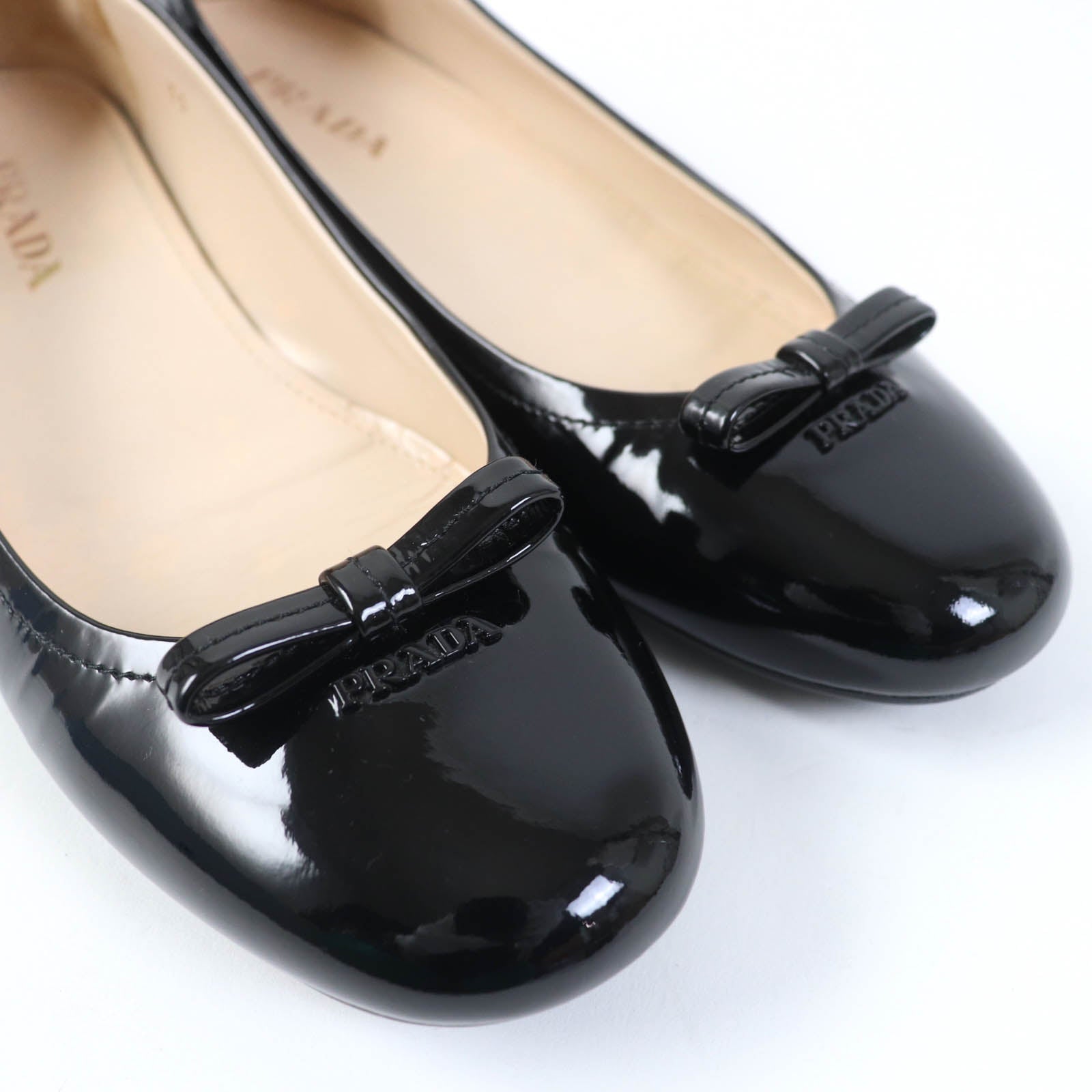 Prada Embossed Logo Leather Pumps Black 35