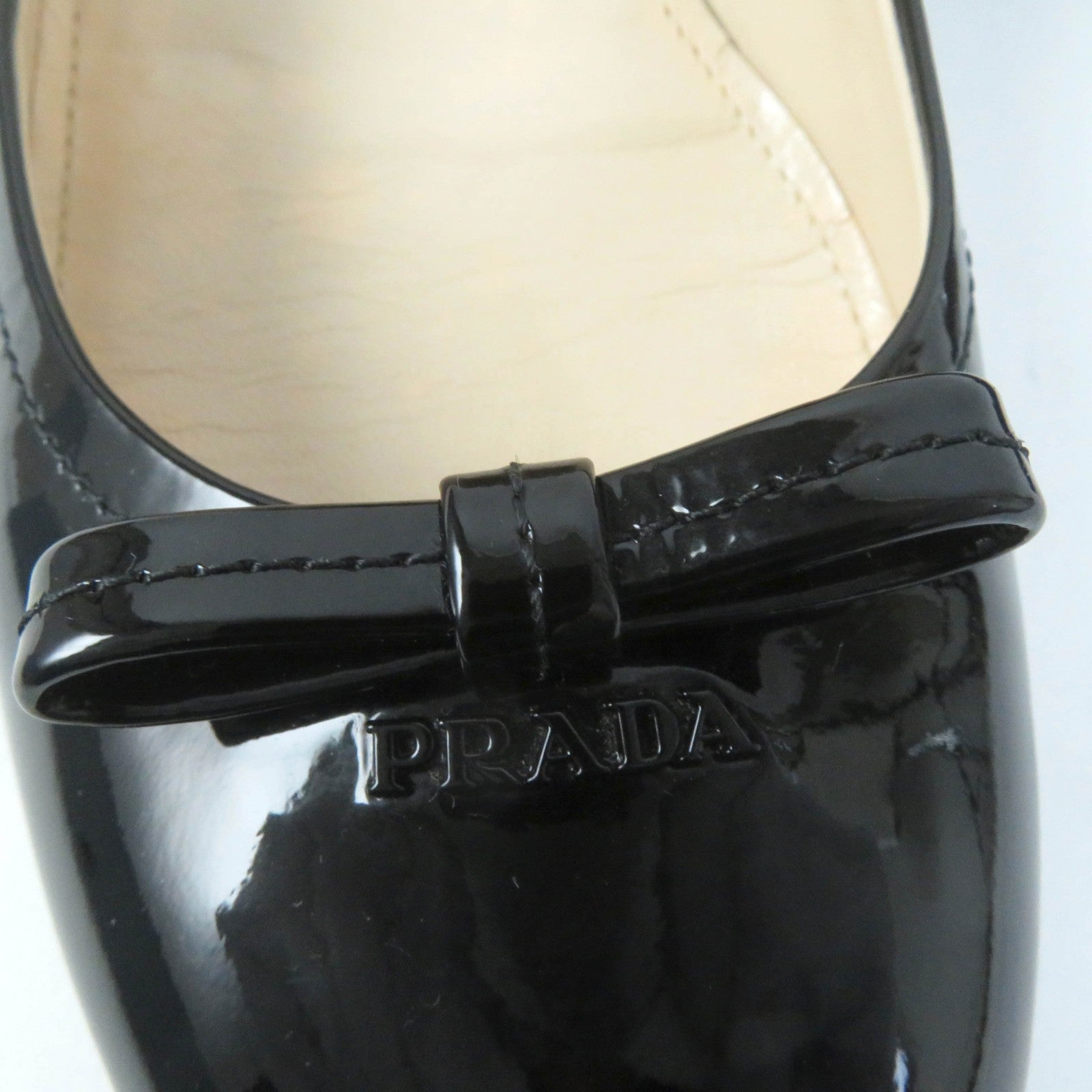 Prada Embossed Logo Leather Pumps Black 35