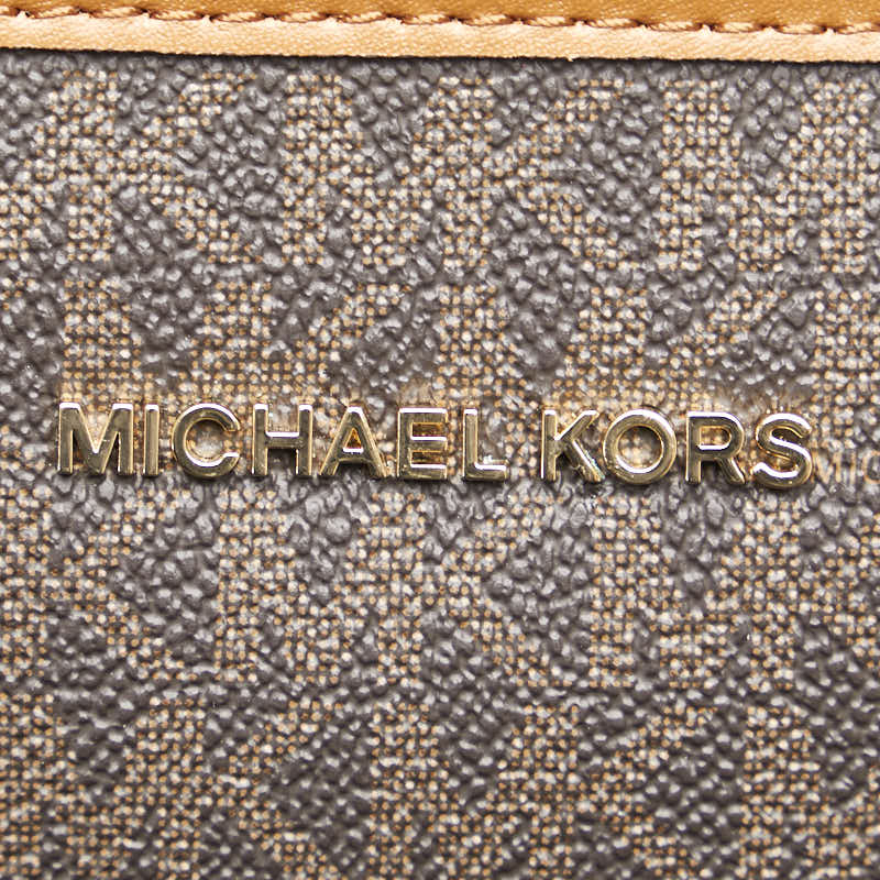 Michael Kors Monogram EVA Extra Small Handbag