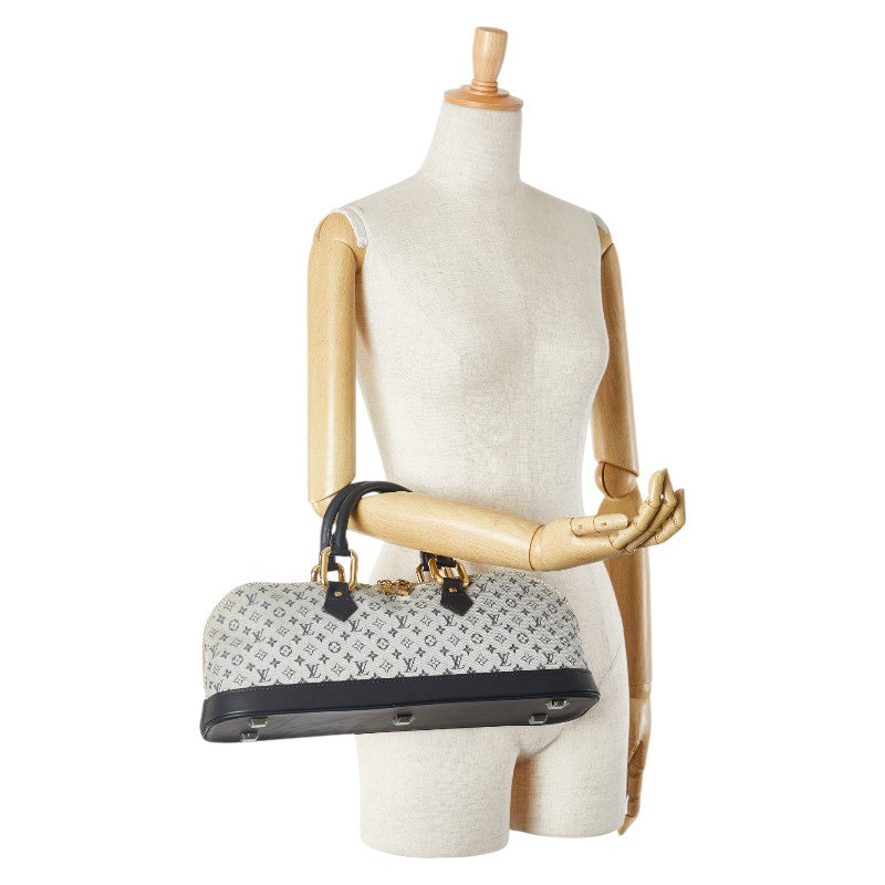 Louis Vuitton Mini Alma Long Canvas Leather Handbag