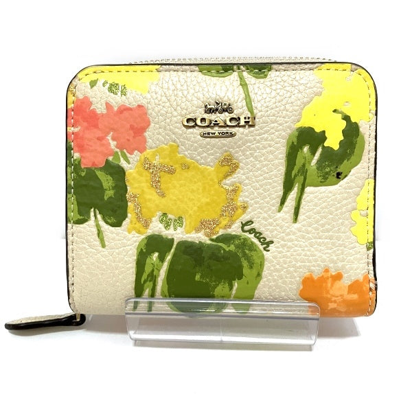 Coach Polished Pebble Leather Bifold Wallet Floral Print in Great Condition