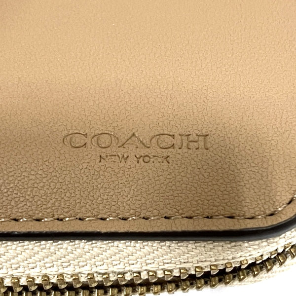 Coach Polished Pebble Leather Bifold Wallet Floral Print in Great Condition