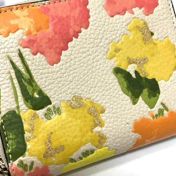 Coach Polished Pebble Leather Bifold Wallet Floral Print in Great Condition