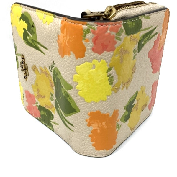 Coach Polished Pebble Leather Bifold Wallet Floral Print in Great Condition