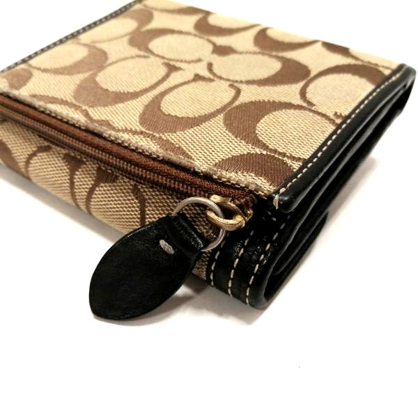 Coach Signature Canvas Turnlock Bifold Wallet in Good Condition