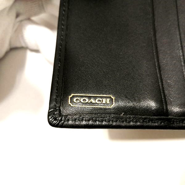 Coach Signature Canvas Turnlock Bifold Wallet in Good Condition