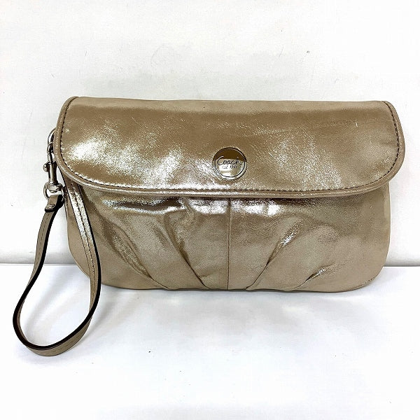 Coach Champagne Gold Clutch Bag in Good Condition