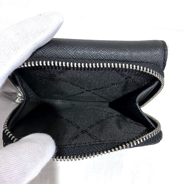 Michael Kors Black Leather Tri-Fold Wallet in Good Condition