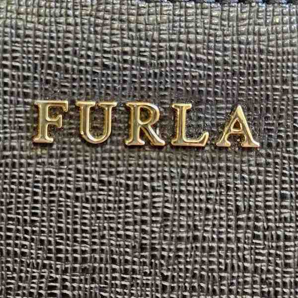 Furla Black Leather Pouch for Women in Great Condition