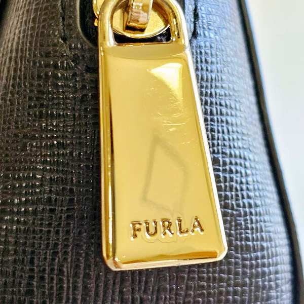 Furla Black Leather Pouch for Women in Great Condition