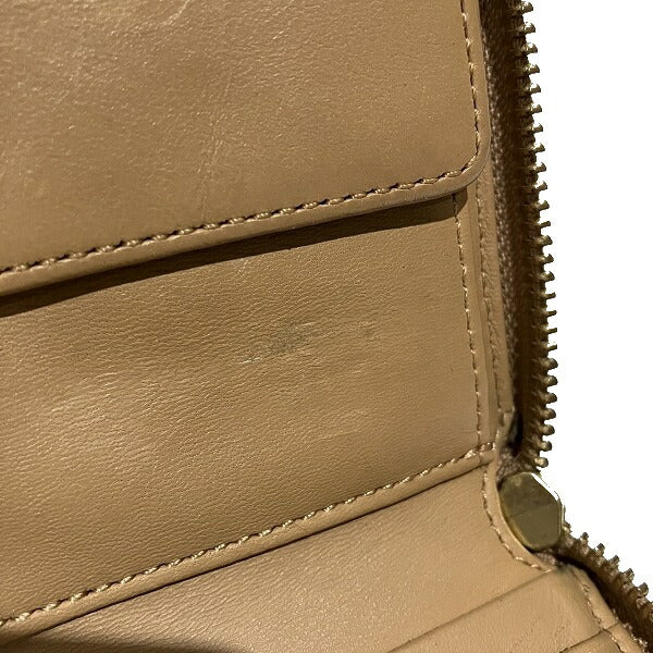 Cole Haan Beige Bifold Wallet PVC Leather in Good Condition