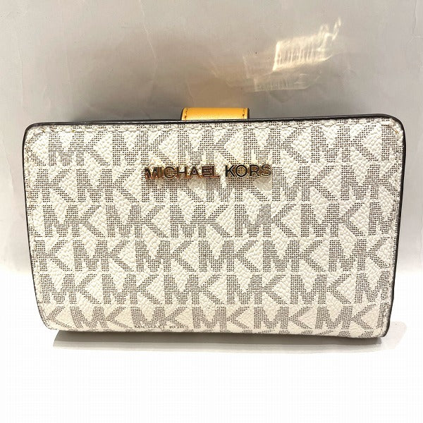 Michael Kors Coated Canvas Leather MK Signature Bifold Wallet in Good Condition