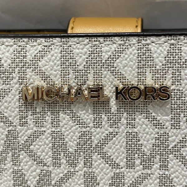 Michael Kors Coated Canvas Leather MK Signature Bifold Wallet in Good Condition