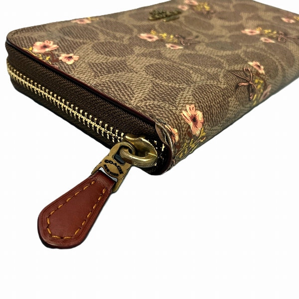 Coach Signature 67245 Floral Zip-Around Long Wallet in Good Condition