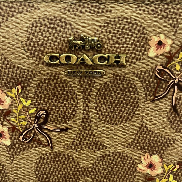 Coach Signature 67245 Floral Zip-Around Long Wallet in Good Condition