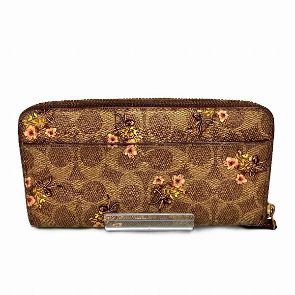 Coach Signature 67245 Floral Zip-Around Long Wallet in Good Condition