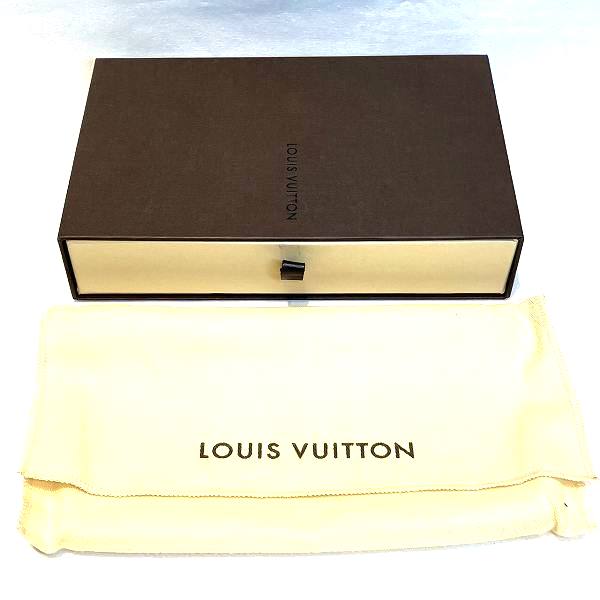 Louis Vuitton Taiga Leather Bifold Wallet M31008 in Good Condition