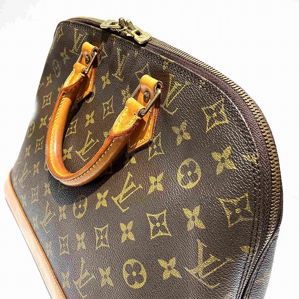 Louis Vuitton Alma Monogram Handbag M51130