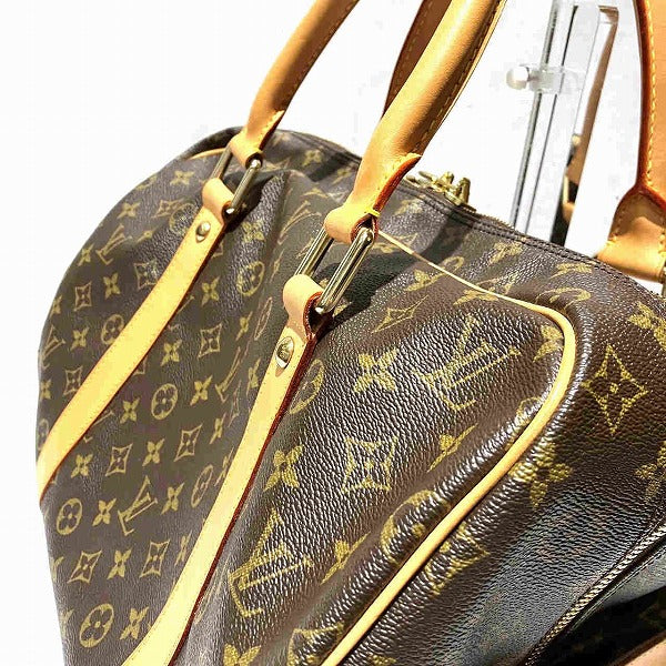 Louis Vuitton Monogram Carryall Handbag M40074