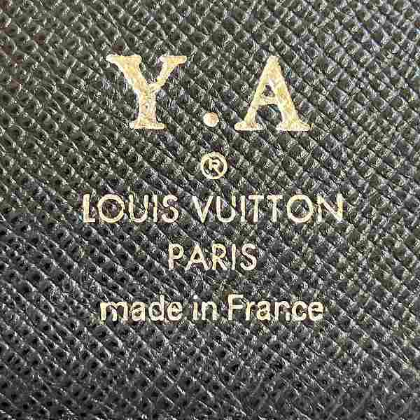 Louis Vuitton Taiga Leather Long Wallet M31002 in Fair Condition