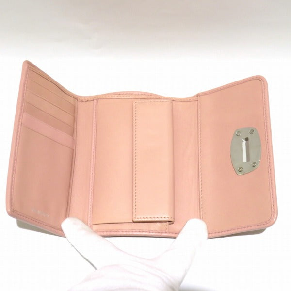 Miu Miu Leather Turn Lock Trifold Wallet in Good Condition