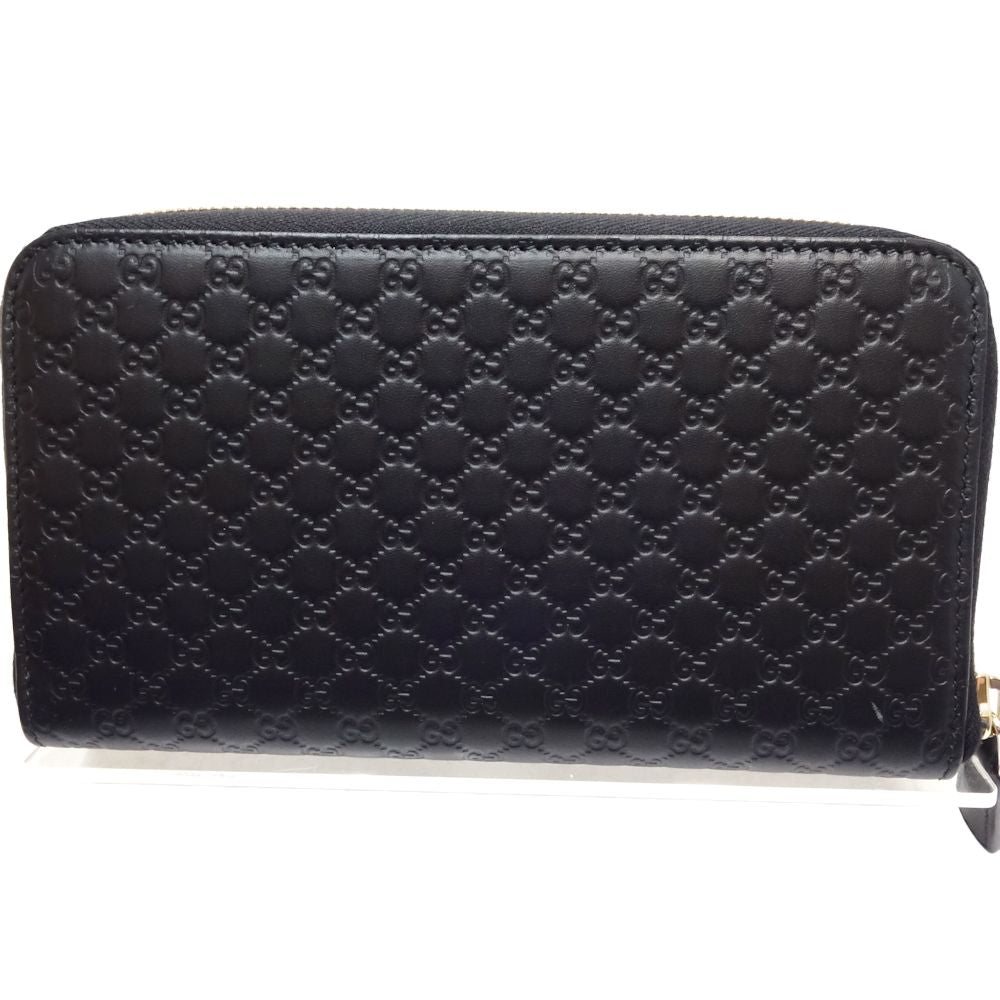 Gucci Leather Microguccissima Zip Wallet Black