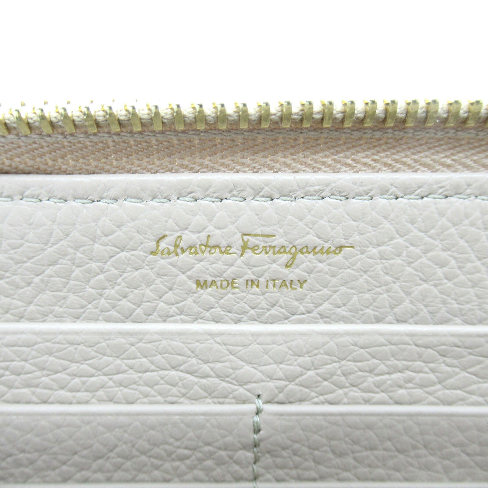 Salvatore Ferragamo Leather Round Wallet Beige