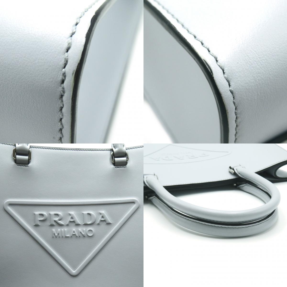 Prada Embossed Logo 2Way Handbag Blue