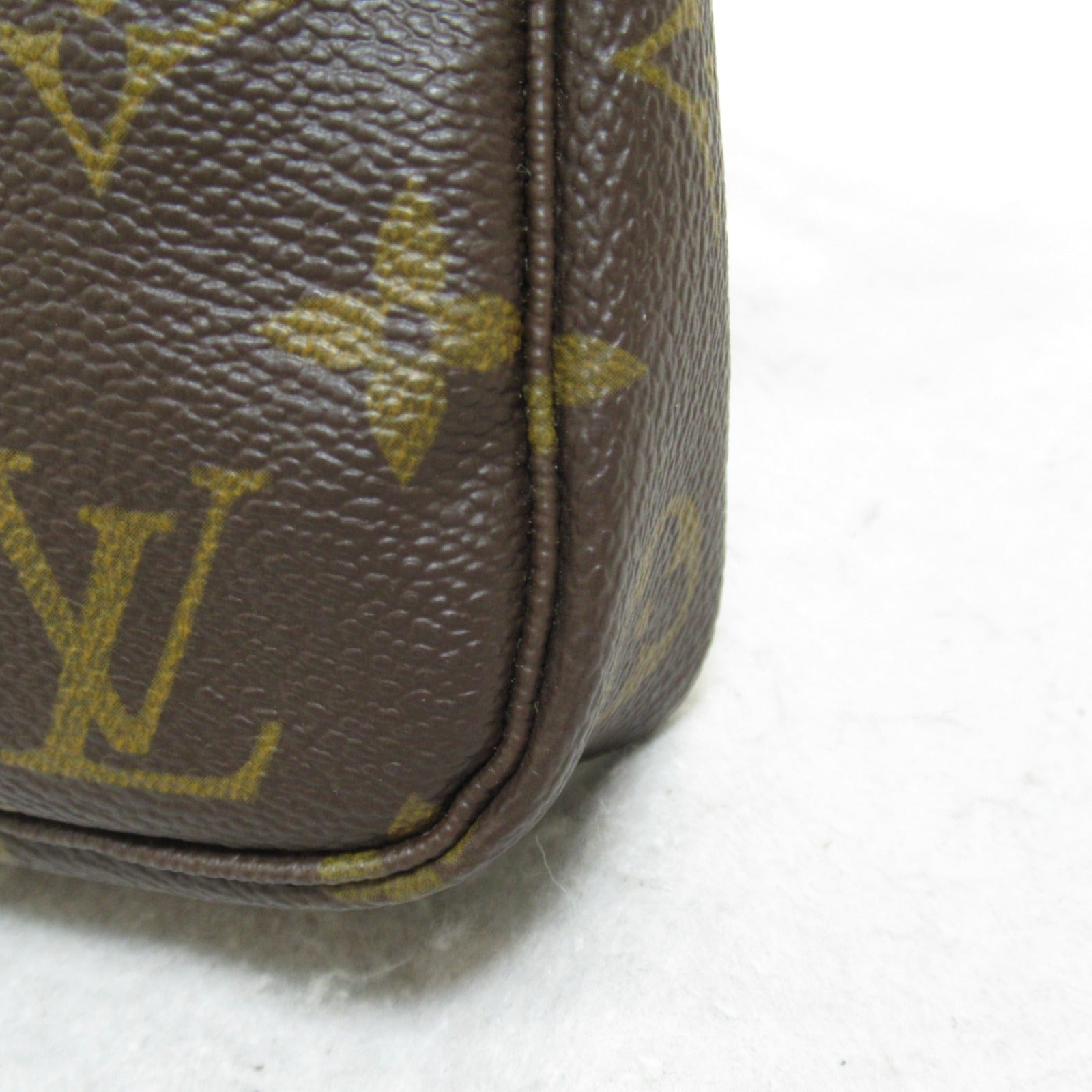 Louis Vuitton Monogram Pochette Accessoires Clutch M51980