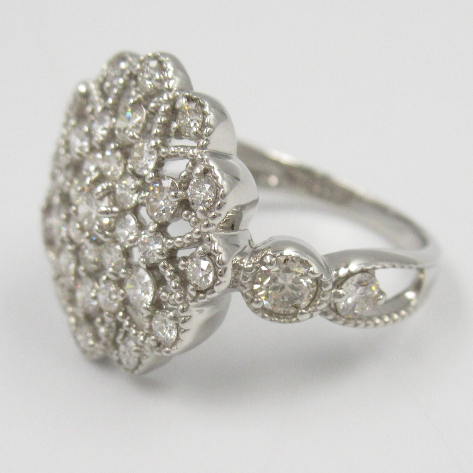 LuxUness Platinum Diamond Flower Ring  Metal Ring in Great Condition