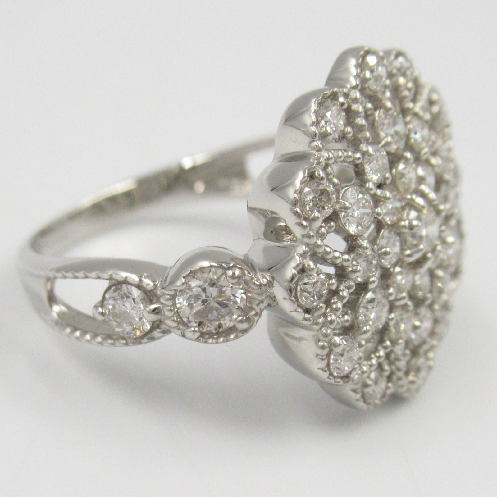 LuxUness Platinum Diamond Flower Ring  Metal Ring in Great Condition