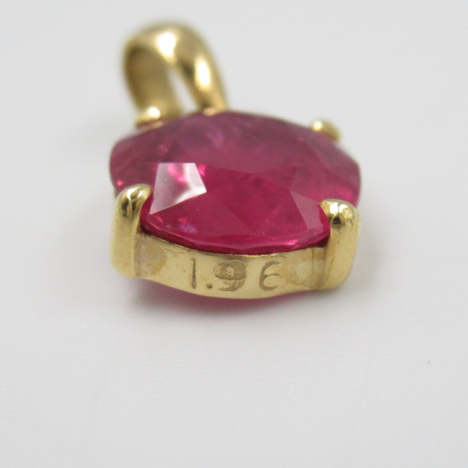 LuxUness 18K Ruby Pendant Metal Pendant in Great Condition