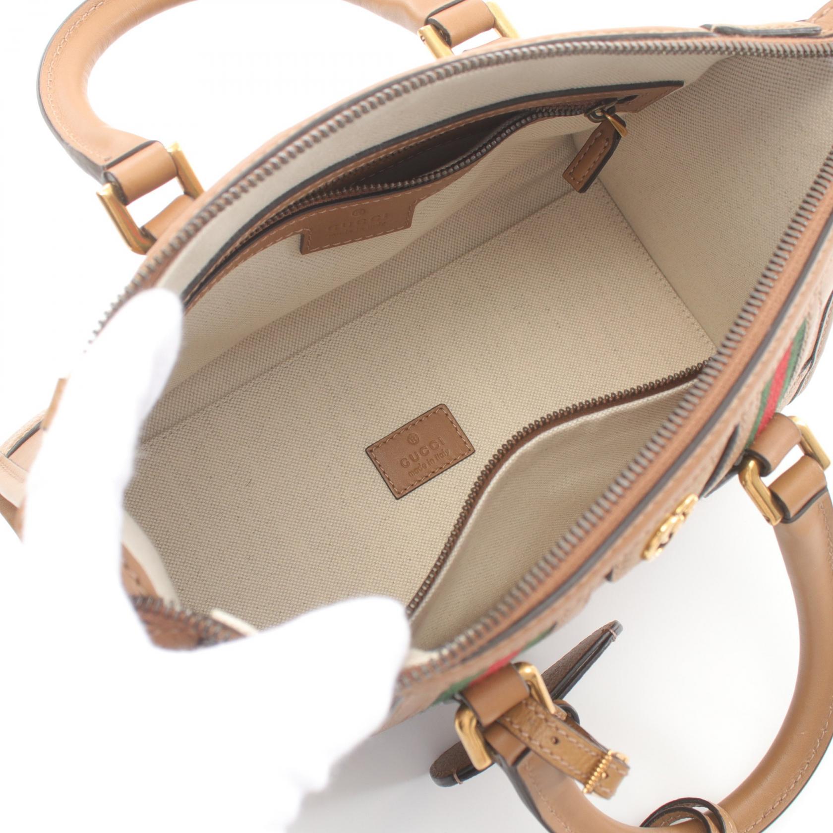 Gucci Leather Canvas Handbag 715772