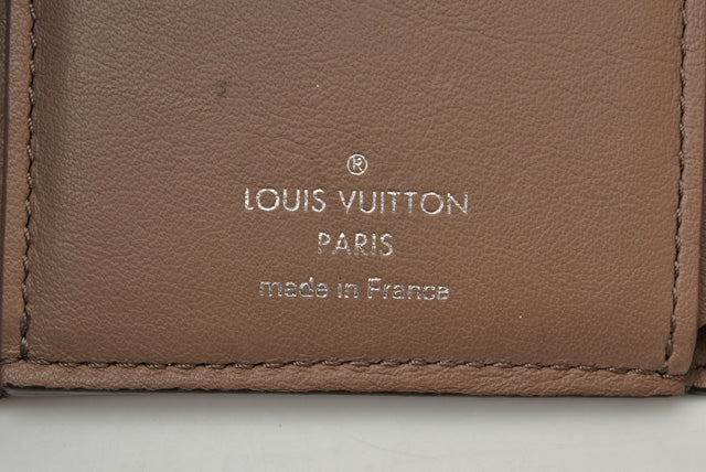 Louis Vuitton Tri-Fold Wallet Portefeuille Capucines Compact M62156 in Great Condition