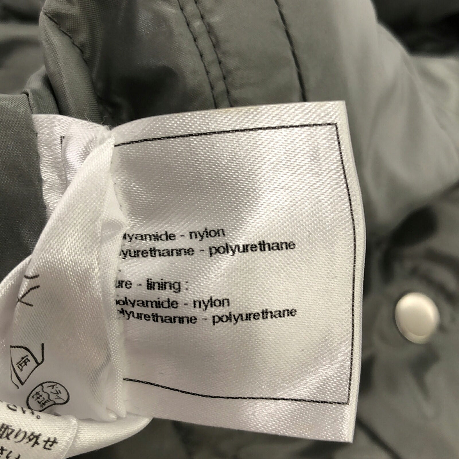 Chanel Nylon Down Jacket Gray Outerwear